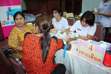 Citizens receive blood tests to check for calories in their blood during the recent “Pattaya Loves Health” project.