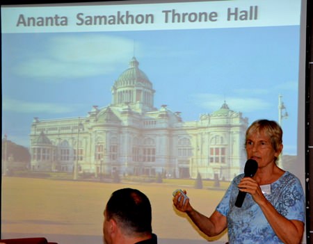 Chair Pat Koester talks about an upcoming day trip to Bangkok for PCEC members and friends.