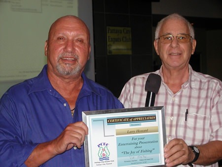 MC Richard Silverberg presents Larry with a Certificate of Appreciation, thanking him for his enjoyable talk.
