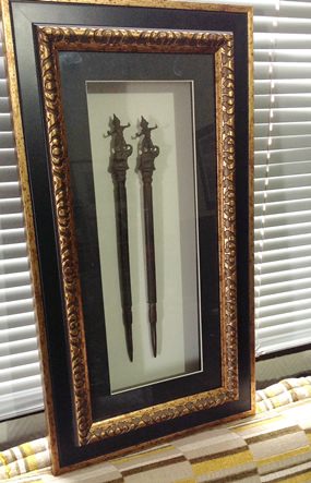 Antique Burmese tattoo needles in frame donated by Mark Gorda.