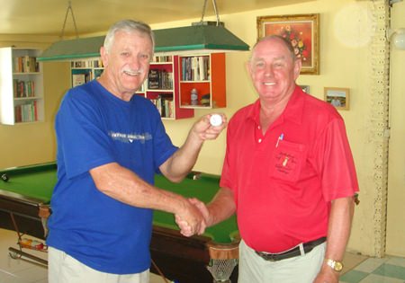 Capt. Bob (right) congratulates John Player on his hole in one at Bangpra.