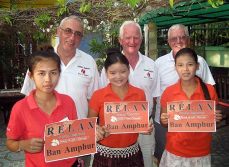 Tuesday’s winners pose with staff at The Relax Bar.