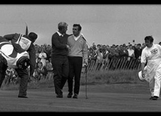 Jack Nicklaus and Tony Jacklin shake hands as the walk off the 18th green during the 1969 Ryder Cup at Royal Birkdale, northwest England.