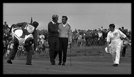 Jack Nicklaus and Tony Jacklin shake hands as the walk off the 18th green during the 1969 Ryder Cup at Royal Birkdale, northwest England.