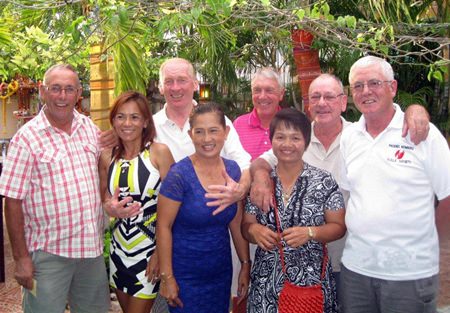 Tuesday winners pose with the staff at The Relax Bar.