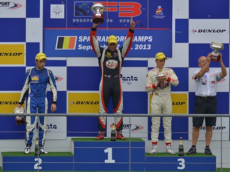 Sandy Stuvik (center) celebrates victory on the podium after victory in race 1 at the Spa Francorchamps racetrack in Belgium, Saturday, Sept. 7.