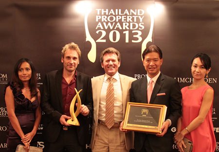 (From left): Sukanya Gale, Winston Gale, founder and co- developer of The Palm, Clayton Wade, Premier Homes & awarding judge, Birathon Kasemsri Na Ayudaya, partner in The Palm, and wife Kazuko Kasemsri, pose for a photo at the conclusion of the 2013 Thailand Property Awards gala dinner held at The Centara Grand in Bangkok, Sept. 19.