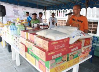 Sattahip officials have collected donated food and other emergency supplies to distribute to flood victims.