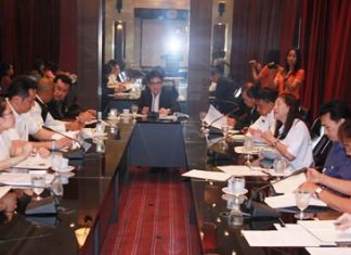Rattanachai Sutidechanai (center), chairman of Pattaya City Council’s Tourism and Sports Committee, leads a budget meeting for 2014 tourism events.
