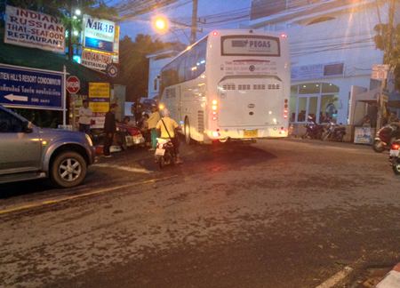 This huge coach cut off the motorbike, which had to brake suddenly, which caused the truck behind to run into it.  Luckily it was all minor, but a fine example of traffic chaos in the area.