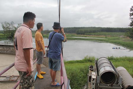 Rayong officials are telling local residents that no environmental damage resulted from the breach of a disused wastewater-treatment reservoir.