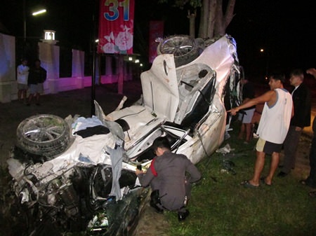 It’s hard to believe anyone could have survived this crash, but apparently Surapol Subcharoen did.  He was still inside when this photo was taken.