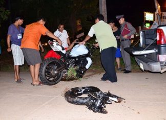 Swedish son of Rayong hotel owner killed in motorcycle crash Police and rescue workers remove what is left of the motorcycle.
