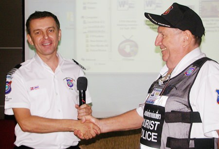 PCEC Board member Hawaii Bob (right) welcomes to Pattaya City Expats Club his boss, Wayne Walton, Group Leader of the Foreign Tourist Police Assistance (FTPA) unit in Pattaya.