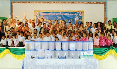 Chai yo!  Everyone is happy with clean drinking water.