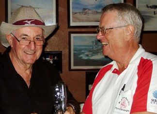 Dick Warberg (right) presents the MBMG Group Golfer of the Month award to Barry Oats.