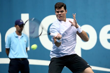 Raonic powers a forehand past Berdych in the final.