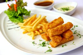 Breaded fish fillet with French fries at Cascade.