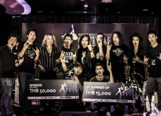 Jakkrapan Kanchoungchote (front center left) poses with the judges and fellow contestants on stage at the conclusion of the Hard Rock Pattaya Guitar Battle, Nov. 16.