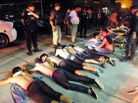 Dozens of teen boys were arrested after two rival youth gangs got into a stick-wielding melee on Loy Krathong.