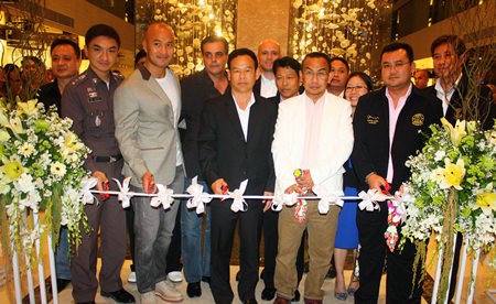 (L to R) Pattaya Police Superintendent Pol. Col. Suwan Cheaonawinthawat, FTV (Thailand) Co., Ltd., President Edward Kitti, Sattahip Naval Base Commander Vice Admiral Chainarong Charoenrak, DSI Eastern Region Chief of Operation Pravit Chaibuadaeng, and the Advisor to the Pattaya Mayor Grit Jiramongkol cut the ribbon for the soft opening.