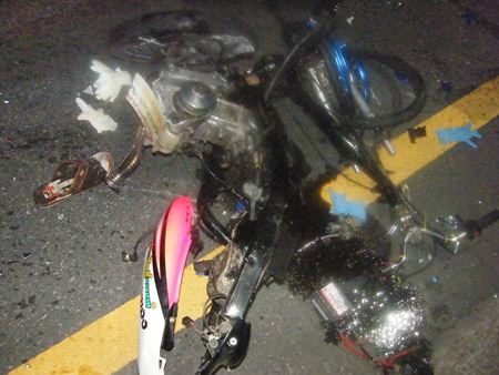 This motorbike is almost unrecognizable after the collision.  The other (not shown) was also clearly demolished.
