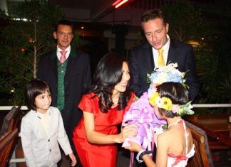 HE Ambassador Enno Drofenik and his family and consul general Hofer are greeted by the children of the CPDC.
