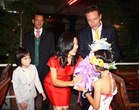 HE Ambassador Enno Drofenik and his family and consul general Hofer are greeted by the children of the CPDC.