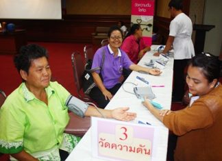 Residents are all smiles during their free health checkups at city hall.