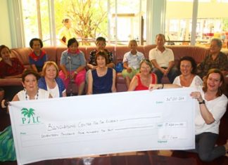 The PILC formerly present a cheque valued at 17,400 Thai Baht to the Banglamung Home for the Elderly for assistance in purchasing two washing machines.