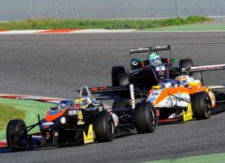 Stuvuk leads a group of three cars through a corner during the European Formula 3 Open Championship season ending race weekend in Barcelona.