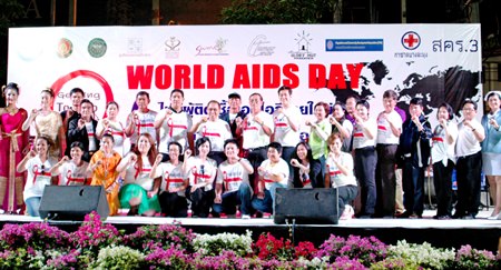 Officials and friends take to the stage on World AIDS Day, announcing the new policy “Getting to zero”.