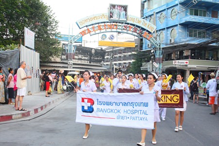 A large contingent of staff from the Bangkok Hospital Pattaya march in the parade.