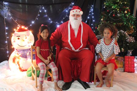 Father Christmas says hi to some GIS students.