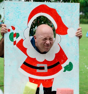 Teacher Mr Beales prepares for a soaking.