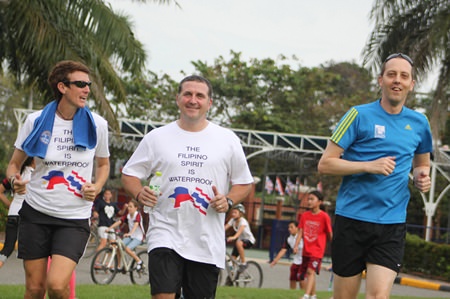 Mr and Mrs McConnell and Mr Russell put in the kilometres for the good cause.