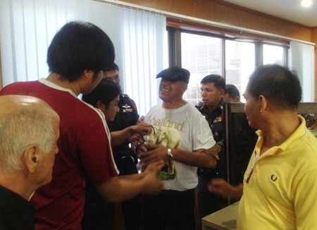 Daniel Mesholam couldn’t explain how a cap, stolen moments earlier, ended up in his pack on his way out of the store.