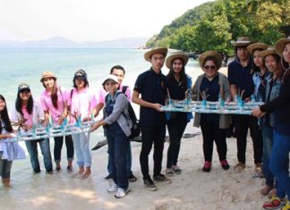 The Royal Thai Navy and friends work to restore the marine environment around Koh Khram to honor HM the King for his recent birthday.