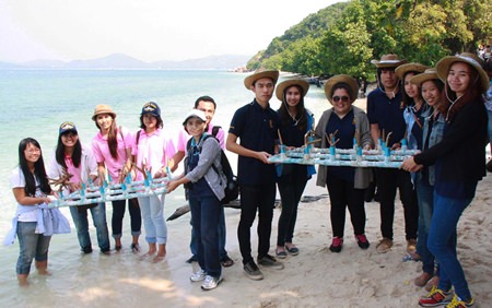 The Royal Thai Navy and friends work to restore the marine environment around Koh Khram to honor HM the King for his recent birthday.