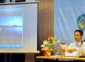 Project director Theeradet Juladung demonstrates the geo-informatics of Pattaya City Guide.