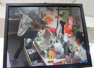 The thief is caught on the store video surveillance camera as he begins his escape.