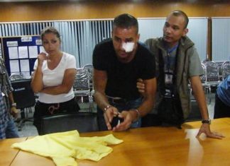 Leila Boukazza (left) and Mohamed Meghraoui (center, with bandage on face) have been arrested and charged with burglary and immigration charges.