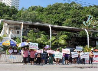 “This land is not for sale!” Protestors gather near Bali Hai in response to rumors that public land had been sold for commercial use.