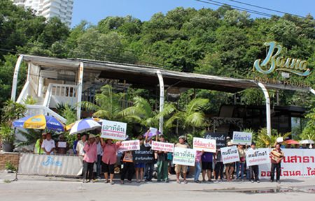 “This land is not for sale!” Protestors gather near Bali Hai in response to rumors that public land had been sold for commercial use.