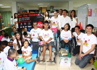 Tune Hotels Pattaya executives and employees brought toys, clothing and cash donations to the Redemptorist Center for Children with Special Needs.