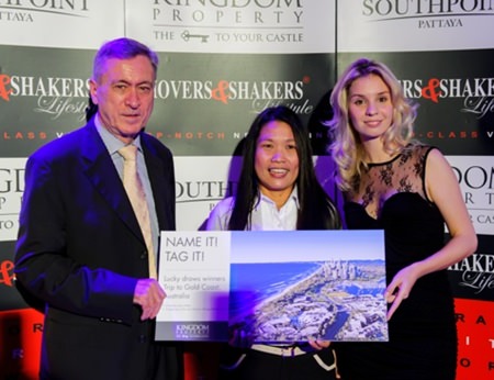 A winning smile: Kingdom Property CEO Nigel Cornick (left) and Vice President of Marketing Irina Breslavtseva (right) pose with Ananya Puangkulab (centre), one of the winners of the company’s naming competition for Mustique, Wong-Amat Beach.