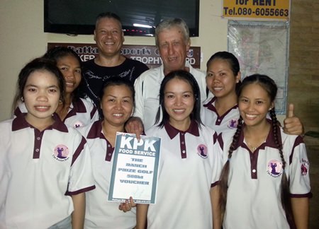 Geoff Parker receives the KPK voucher from Buff surrounded by the girls from The Ranch.