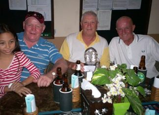 Tony Scambler (centre) receives the November Golfer of the Month trophy, congratulated by Gordon Melia (right) – the golfer of the week!