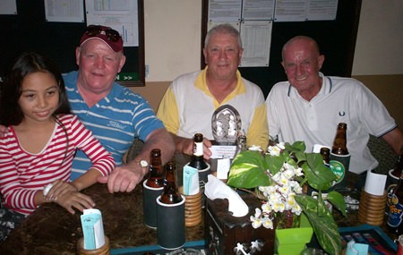 Tony Scambler (centre) receives the November Golfer of the Month trophy, congratulated by Gordon Melia (right) – the golfer of the week!