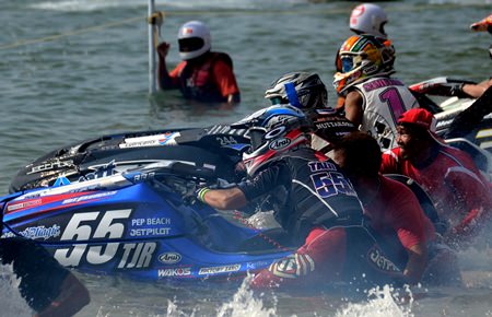 Racers prepare at the start line.